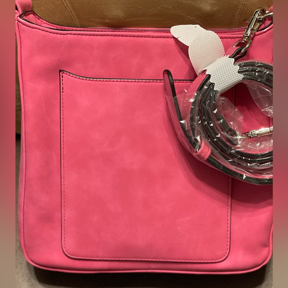 New without tags. Pink vegan crossbody.